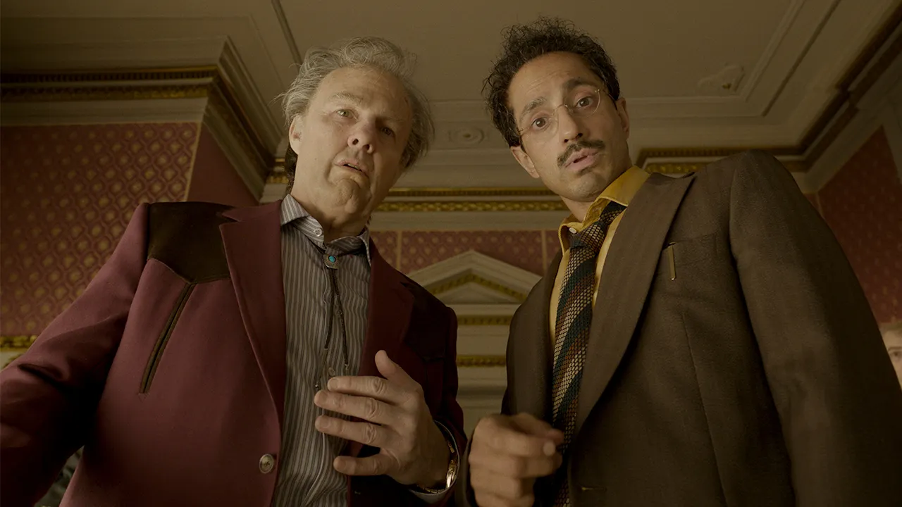 Rockwell and Ganesh looking at the camera