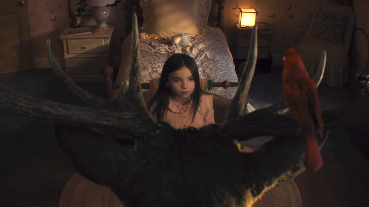 A little girl examines a deer and bird in her room