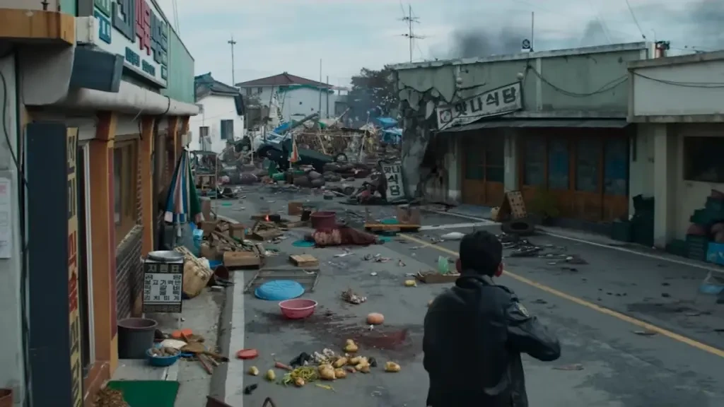 Go Bum-seok overlooking the ruined town