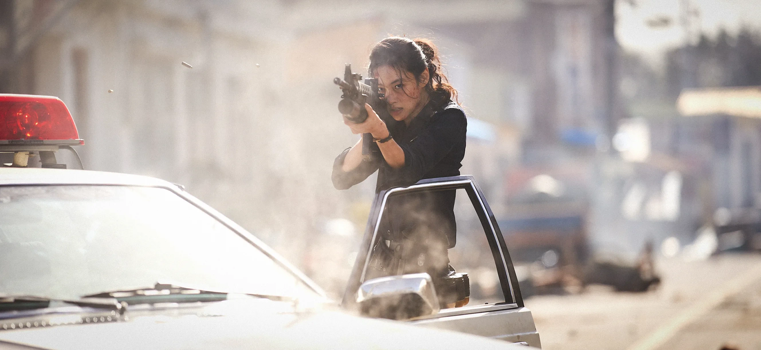 Lim Sung-ae firing a rifle